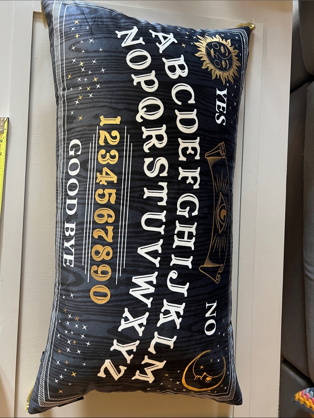 Black and Gold Ouija Board Accent Pillow by. Cynthia Rowley